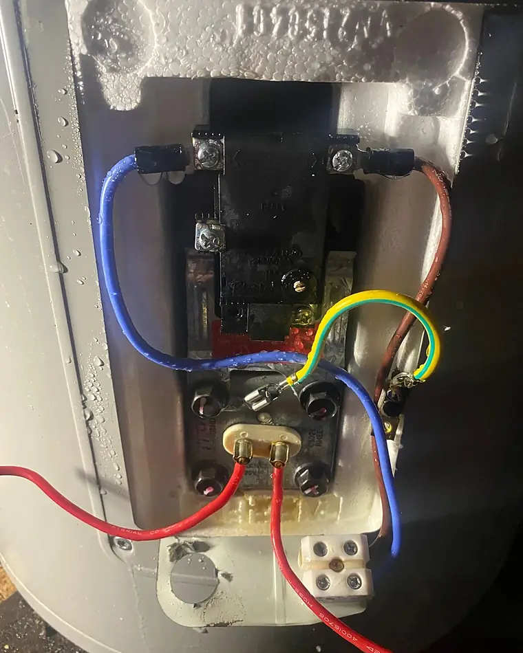 Hot water system element and thermostat wiring, opened up for repair