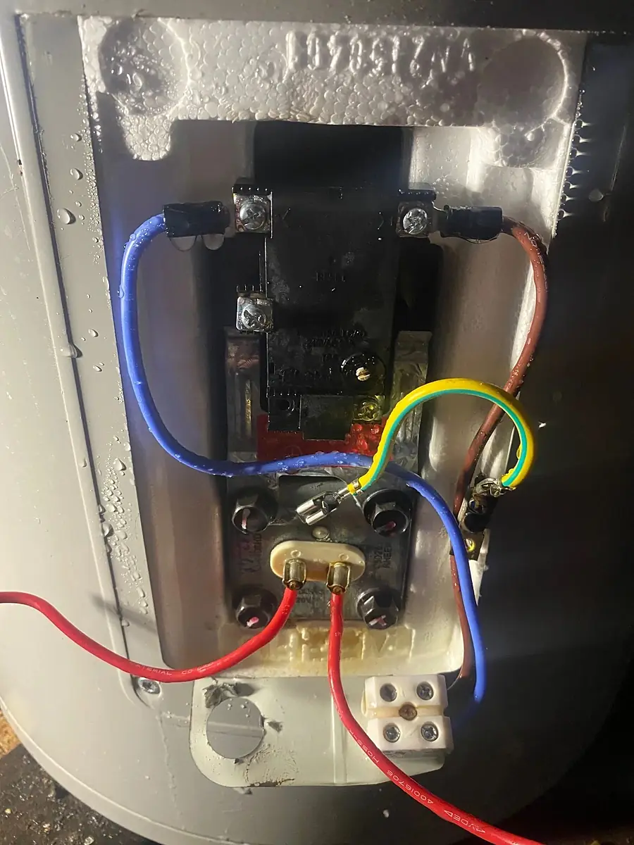 Hot water system element and thermostat wiring, opened up for repair