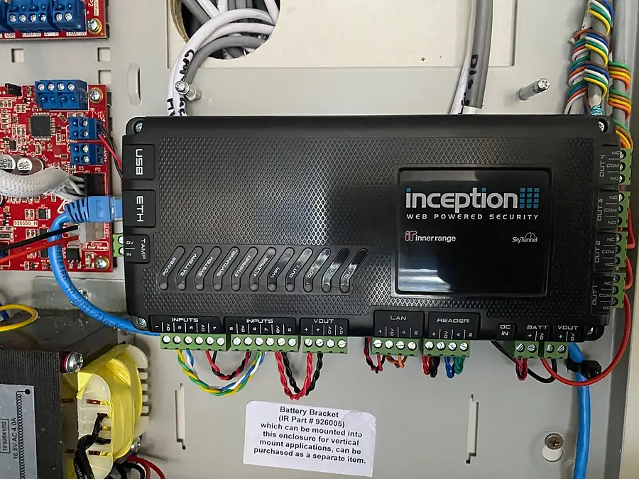 An Inner Range Inception security controller wired into its enclosure